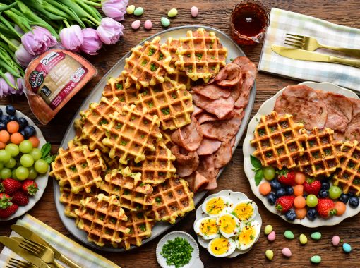 Ham and Cheddar Cornmeal Waffles served on a table for Easter breakfast
