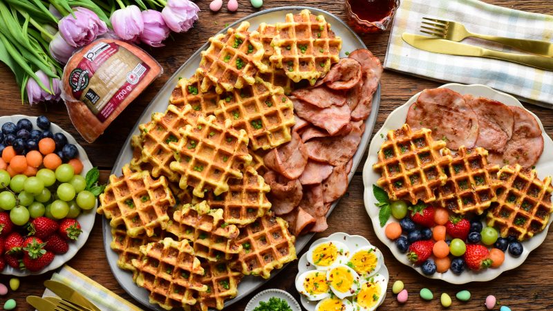 Ham and Cheddar Cornmeal Waffles served on a table for Easter breakfast